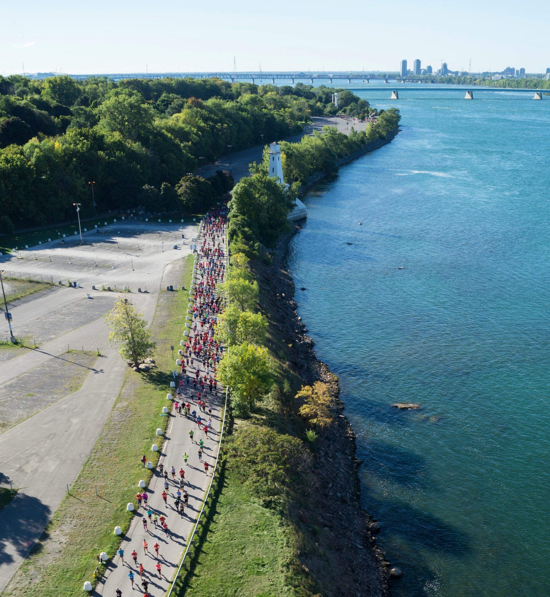 aerial view of city near body of water during daytime